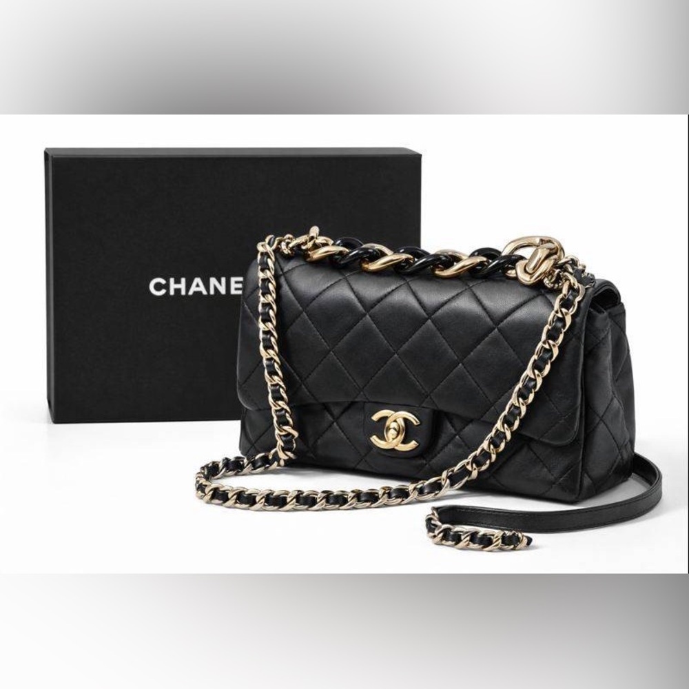 Chanel 19 Navy blue Quilted champagne color strap.